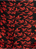 Chal tejido para mujer con diseño. Arelis Negro-Coral